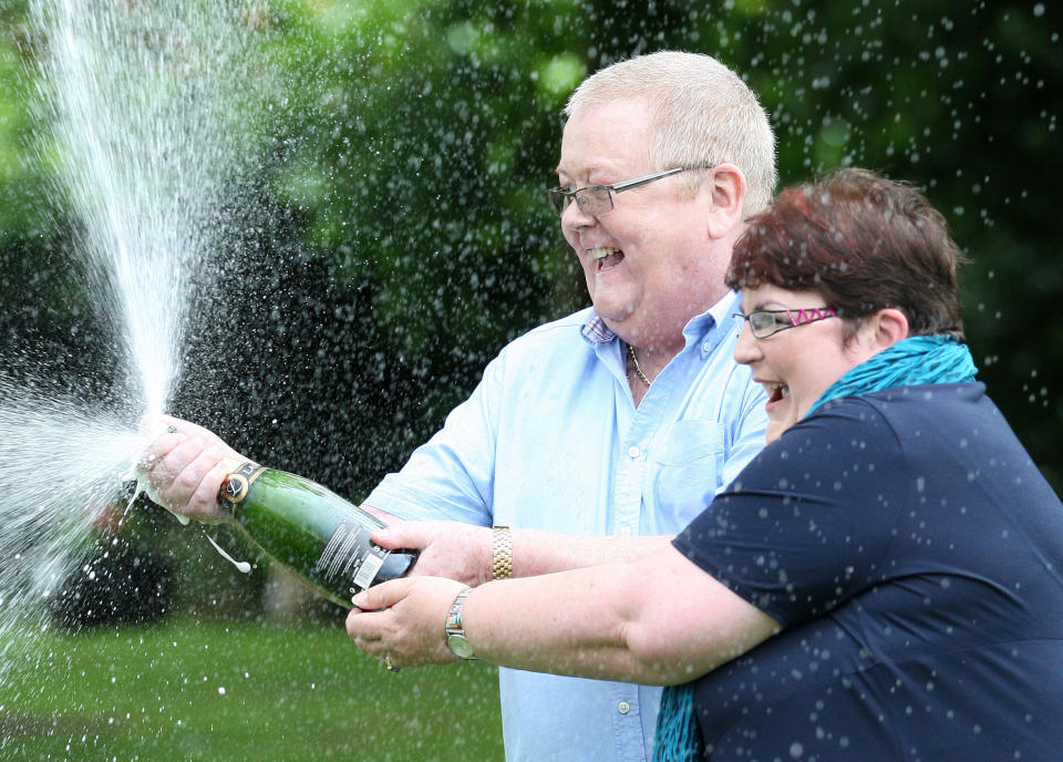 Colin and Chris Weir, from Largs in Ayrshire, celebrate their win at the Macdonald Inchyra Hotel & Spa in Falkirk, after they scooped £161 million in Tuesday's EuroMillions draw.