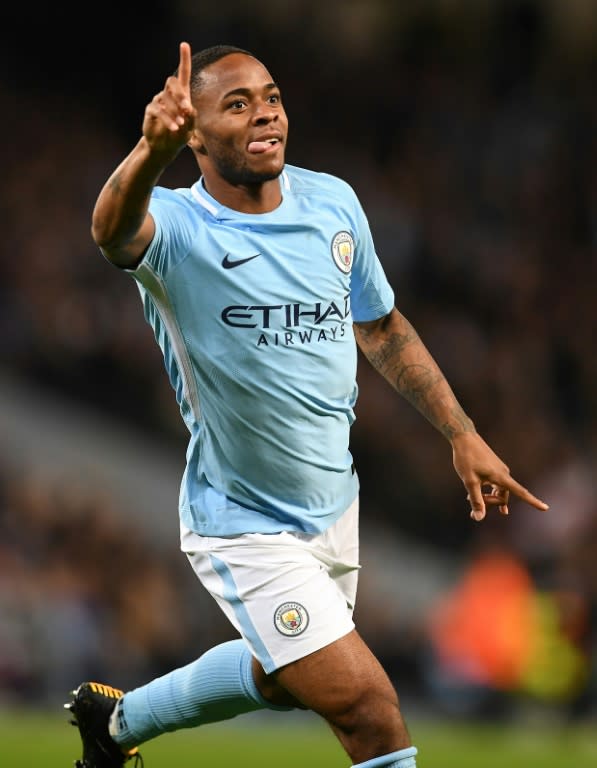 Manchester City's midfielder Raheem Sterling celebrates scoring the opening goal against Napoli on October 17, 2017