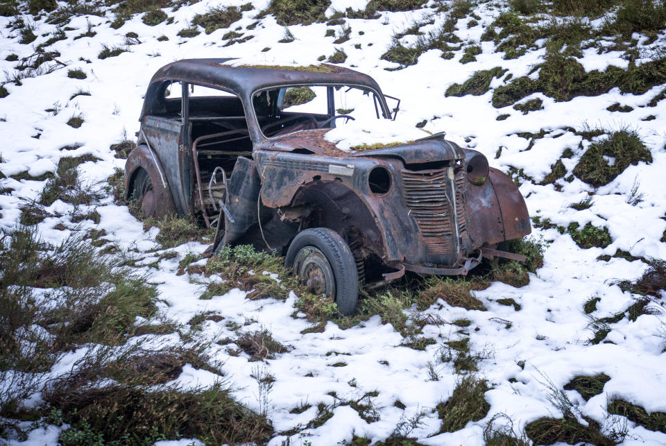 An abandoned vintage car sits surrounded by snow in the Cairngorms National Park in the Scottish Highlands. Picture date: Monday January 18, 2021. (Photo by Jane Barlow/PA Images via Getty Images)