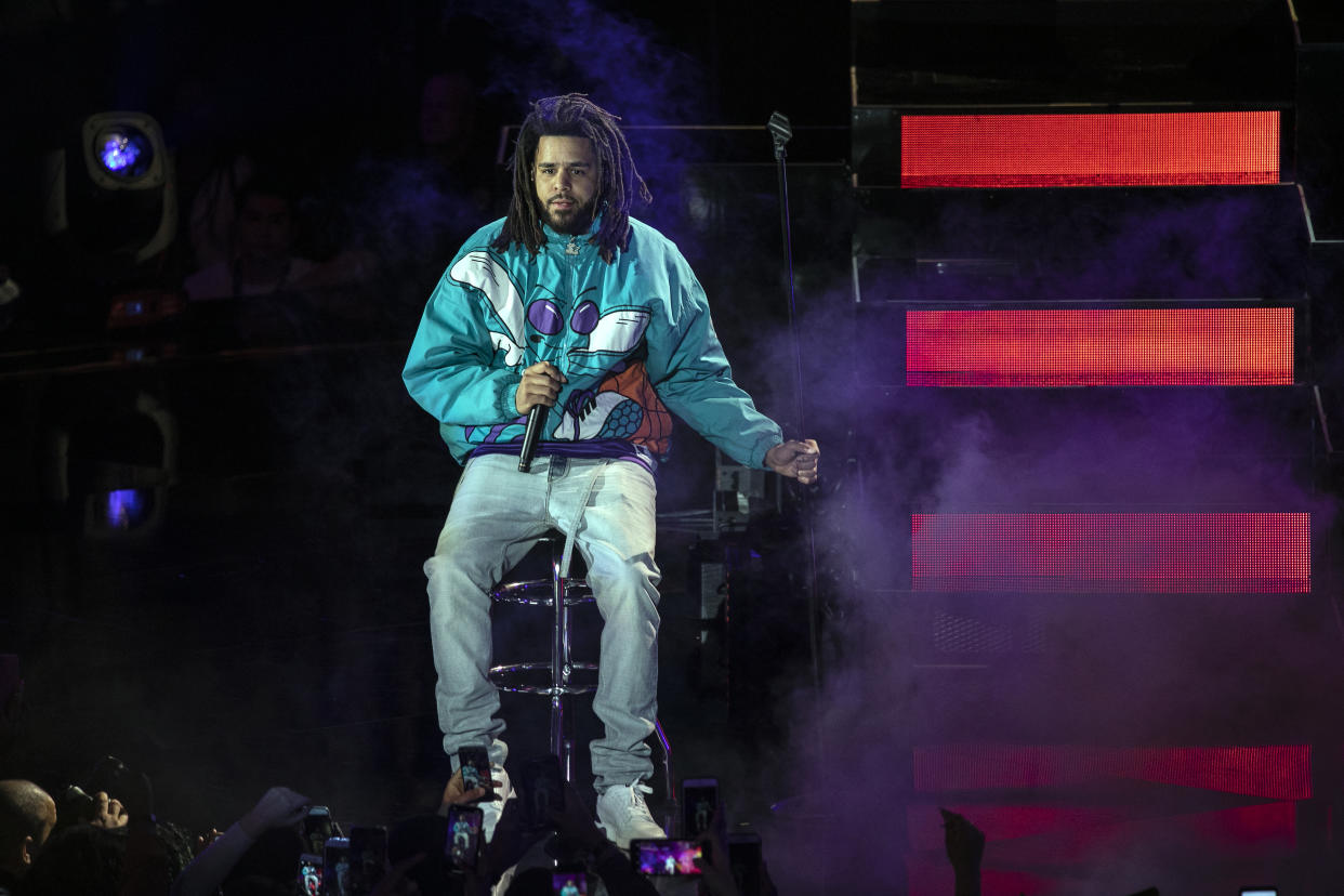 CHARLOTTE, NORTH CAROLINA - FEBRUARY 17: Rapper J. Cole performs during halftime of the 68th NBA All-Star Game  on February 17, 2019 in Charlotte, North Carolina. (Photo by Jeff Hahne/Getty Images)