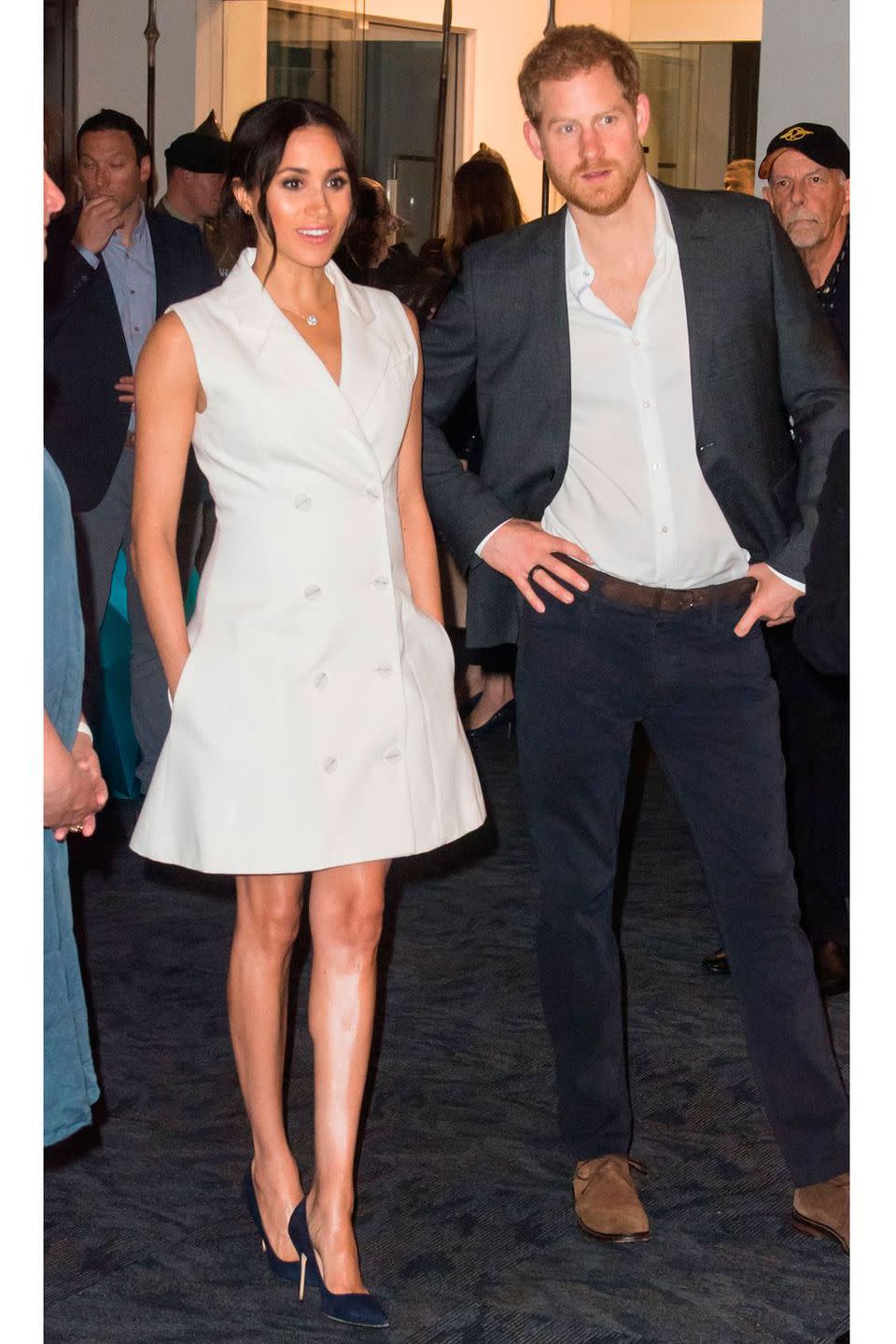 <p><strong>October 2018 </strong>Meghan wore a sleeveless white tuxedo dress by sustainable New Zealand-based brand Maggie Marilyn with navy court shoes, to the Courtney Creative in Wellington.</p><p><a rel="nofollow noopener" href="https://www.net-a-porter.com/gb/en/product/1074846/Maggie_Marilyn/leap-of-faith-cotton-twill-mini-dress" target="_blank" data-ylk="slk:SHOP THE DRESS;elm:context_link;itc:0;sec:content-canvas" class="link ">SHOP THE DRESS</a></p>
