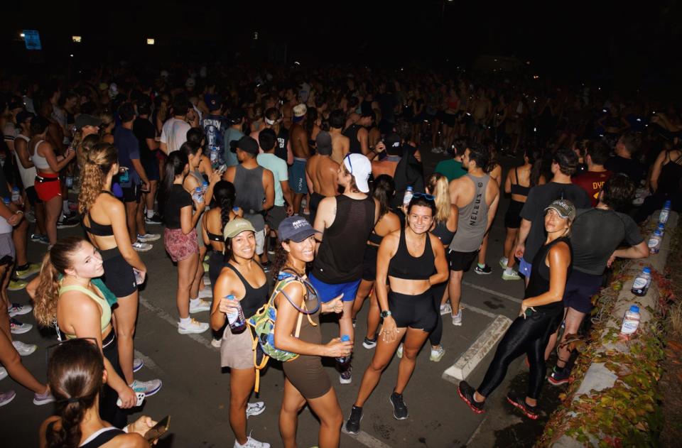 Runners congregate near Venice Beach after a Venice Run Club run