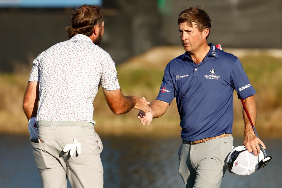 Max Homa and Kevin Kisner shake on the 18th green during round one of the QBE Shootout at Tiburon Golf Club on December 09, 2022 in Naples, Florida. (Photo: Douglas P. DeFelice/Getty Images)