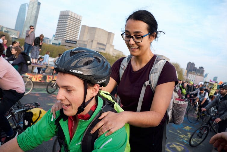 <span class="caption">Cycling: making you happier and the planet healthier.</span> <span class="attribution"><a class="link " href="https://www.shutterstock.com/image-photo/london-uk-april-2019-climate-change-1377599303?src=4jyUEfcD6C-eppnNvs4JyA-1-23" rel="nofollow noopener" target="_blank" data-ylk="slk:G Torres/Shutterstock;elm:context_link;itc:0;sec:content-canvas">G Torres/Shutterstock</a></span>