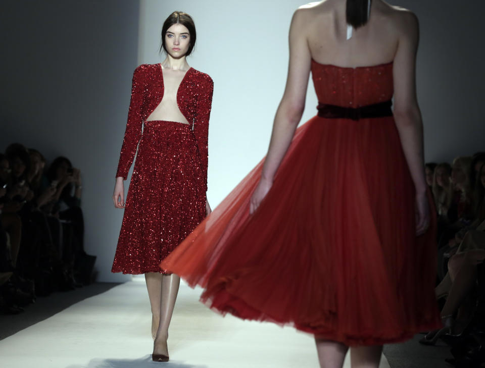 The Jenny Packham Fall 2013 collection is modeled during Fashion Week in New York on Tuesday, Feb. 12, 2013. (AP Photo/Richard Drew)