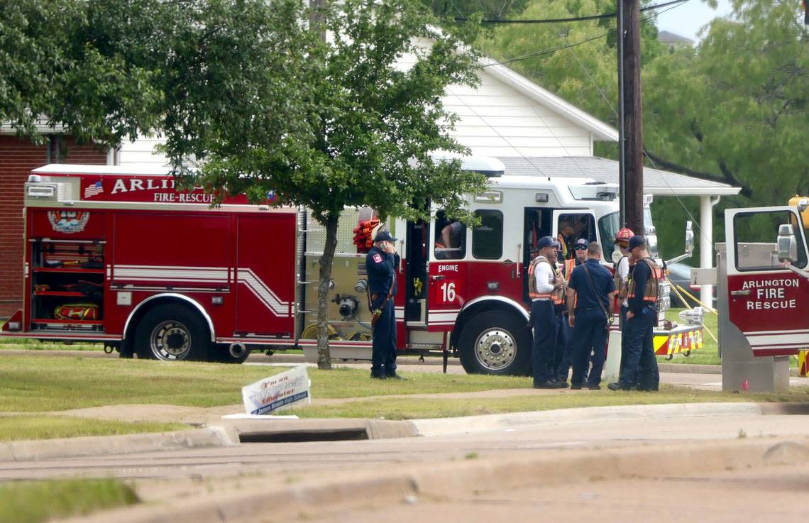 Emergency personnel investigate a shooting outside of Bowie High School in Arlington on Wednesday, April 24, 2024.