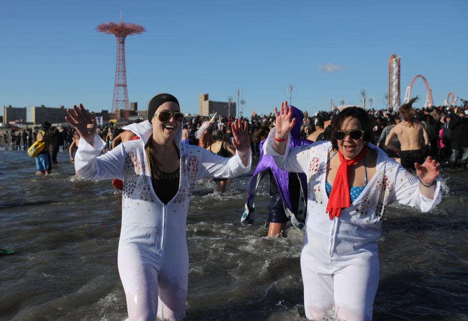 New Yorkers perform polar bear plunge at Coney Island