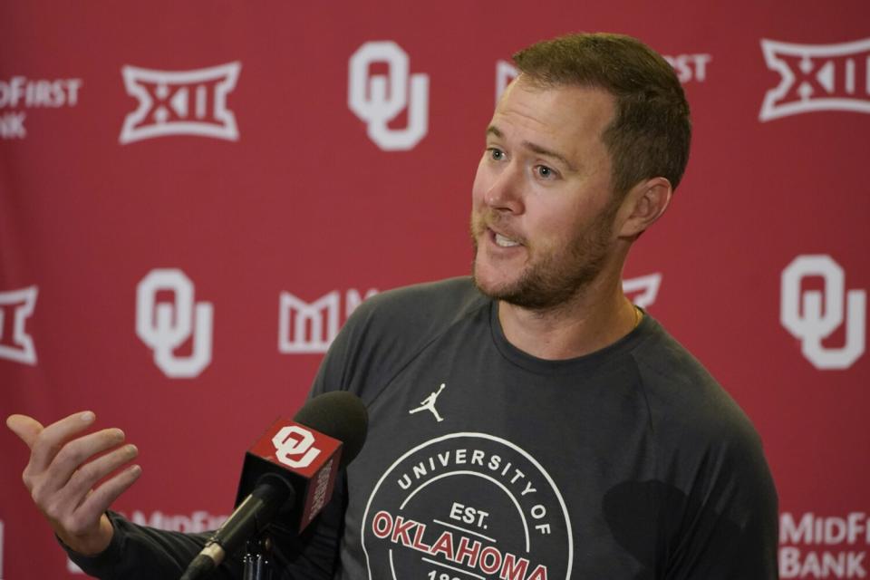 Oklahoma head coach Lincoln Riley answers a question during a news conference in August.