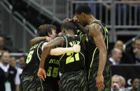 KANSAS CITY, MO - MARCH 09: The Baylor Bears celebrate their 81 to 72 win over the Kansas Jayhawks during the semifinals of the 2012 Big 12 Men's Basketball Tournament at Sprint Center on March 9, 2012 in Kansas City, Missouri. (Photo by Jamie Squire/Getty Images)