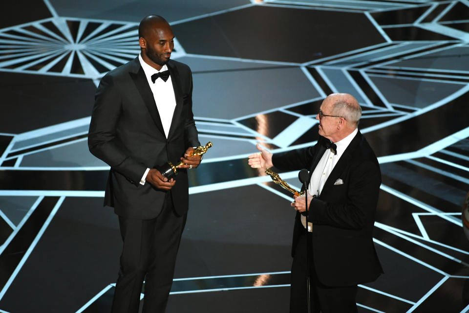 Filmmakers Kobe Bryant and Glen Keane accept Best Animated Short Film for 'Dear Basketball' onstage during the 90th Annual Academy Awards at the Dolby Theatre at Hollywood & Highland Center on March 4, 2018 in Hollywood.
