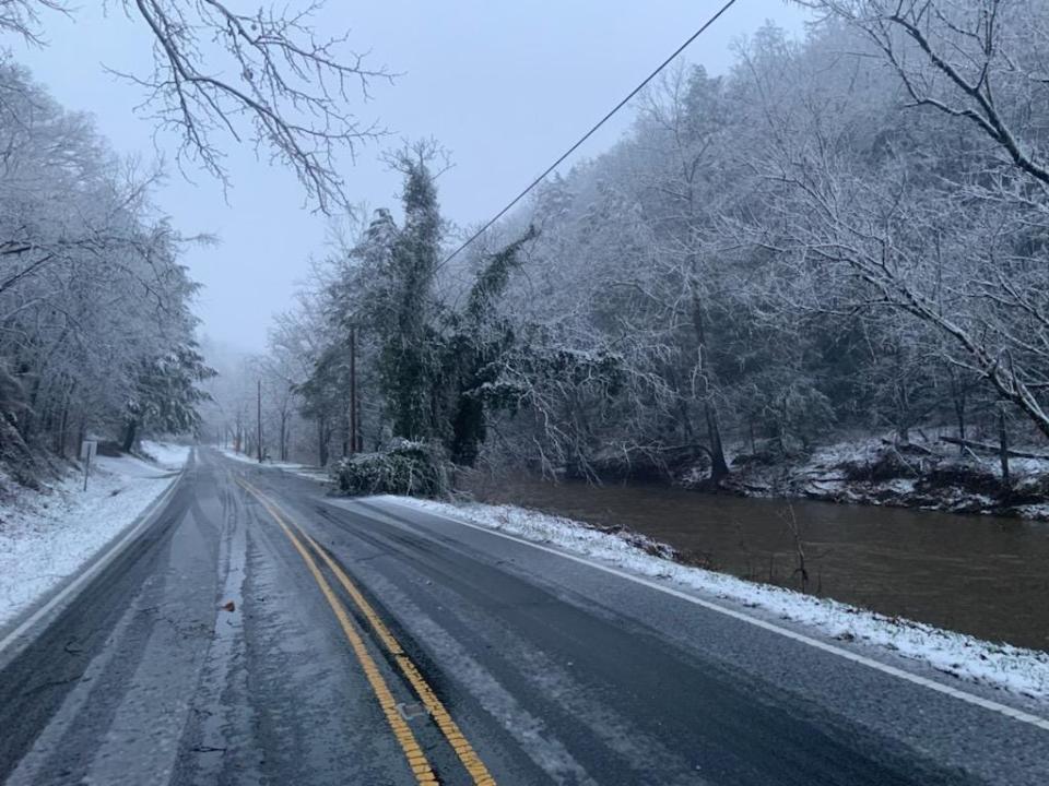 Snow was beginning to stick on River Road in Marshall just after dawn Jan. 3, 2022.