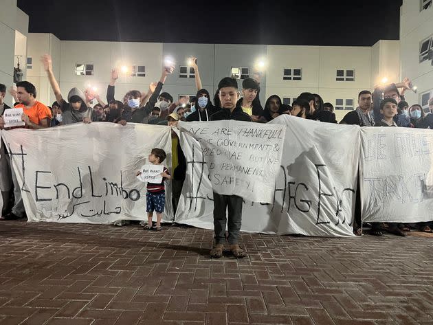 Afghans rallied in a refugee camp in Abu Dhabi, the capital of the United Arab Emirates, to protest their non-transfer to the United States on Feb. 13. (Photo: Sayed Najafizada/NurPhoto via Getty Images)