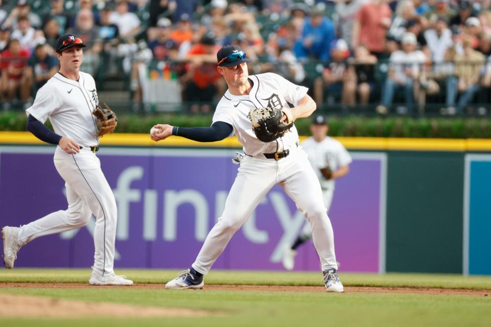 Detroit Tigers first baseman Spencer Torkelson (20) throws to first during the third inning against the Kansas City Royals at Comerica Park in Detroit on Saturday, April 27, 2024.