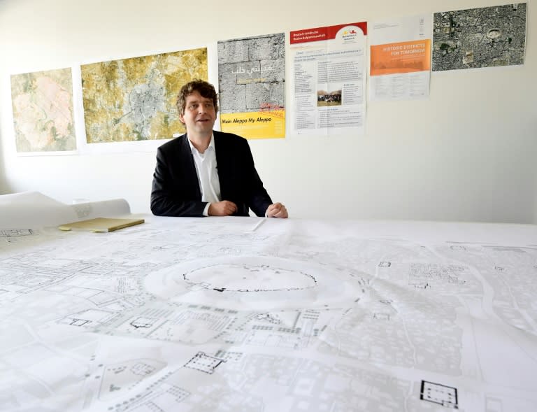 Urban planner Christoph Wessling talks about reconstruction of the devastated Syrian city of Aleppo, at the Brandenburg University of Technology in Cottbus, Germany