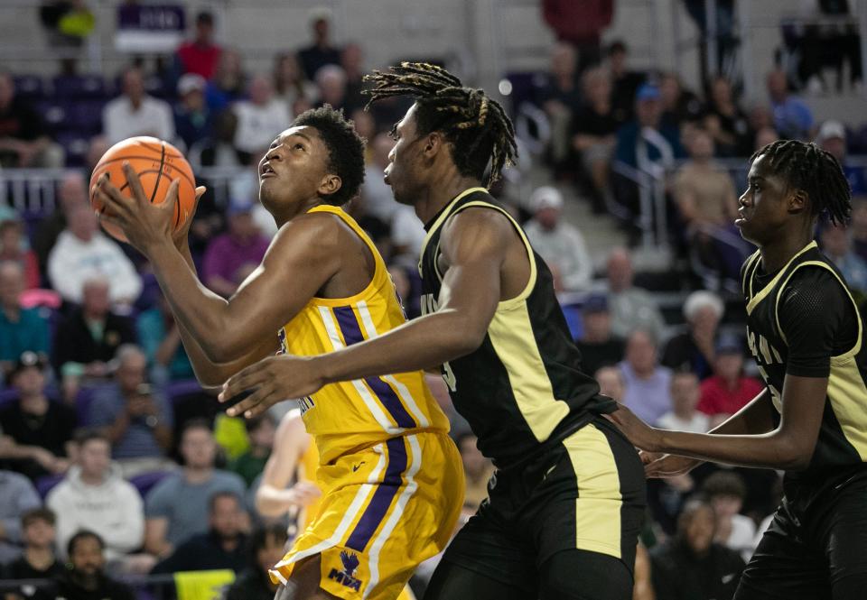 Derik Queen of Montverde Academy looks for a shot against Paul VI at the City of Palms Classic on Friday, Dec. 22, 2023, at Suncoast Credit Union Arena in Fort Myers.