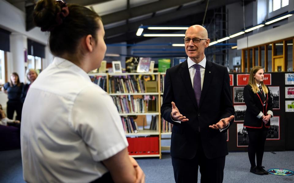 John Swinney claimed in the summer that surveillance of school children through testing would take place - Andy Buchanan/ REUTERS