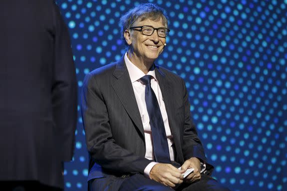 Bill Gates smiling during a panel on Neglected Tropical Diseases.