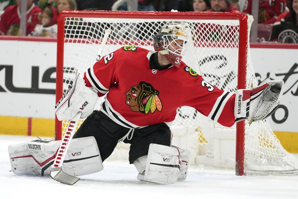 Chicago Blackhawks goaltender Alex Stalock (32) makes a save during the first period of an NHL hockey game against Arizona Coyotes, Friday, Jan. 6, 2023, in Chicago. (AP Photo/Erin Hooley)