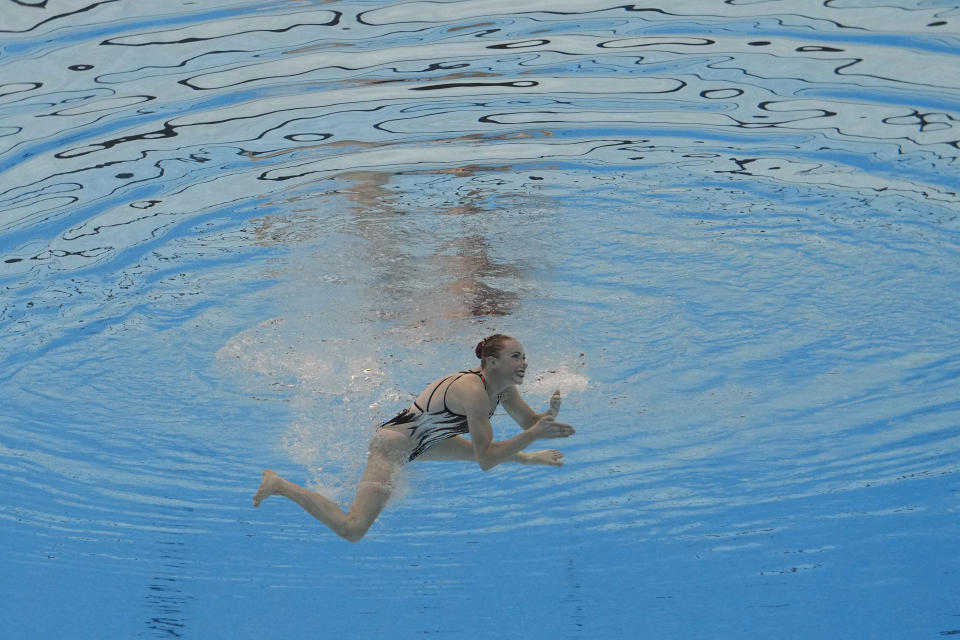 Jacqueline Simoneau of Canada competes in the women's solo free final of artistic swimming at the World Aquatics Championships in Doha, Qatar, Tuesday, Feb. 6, 2024. (AP Photo/Lee Jin-man)