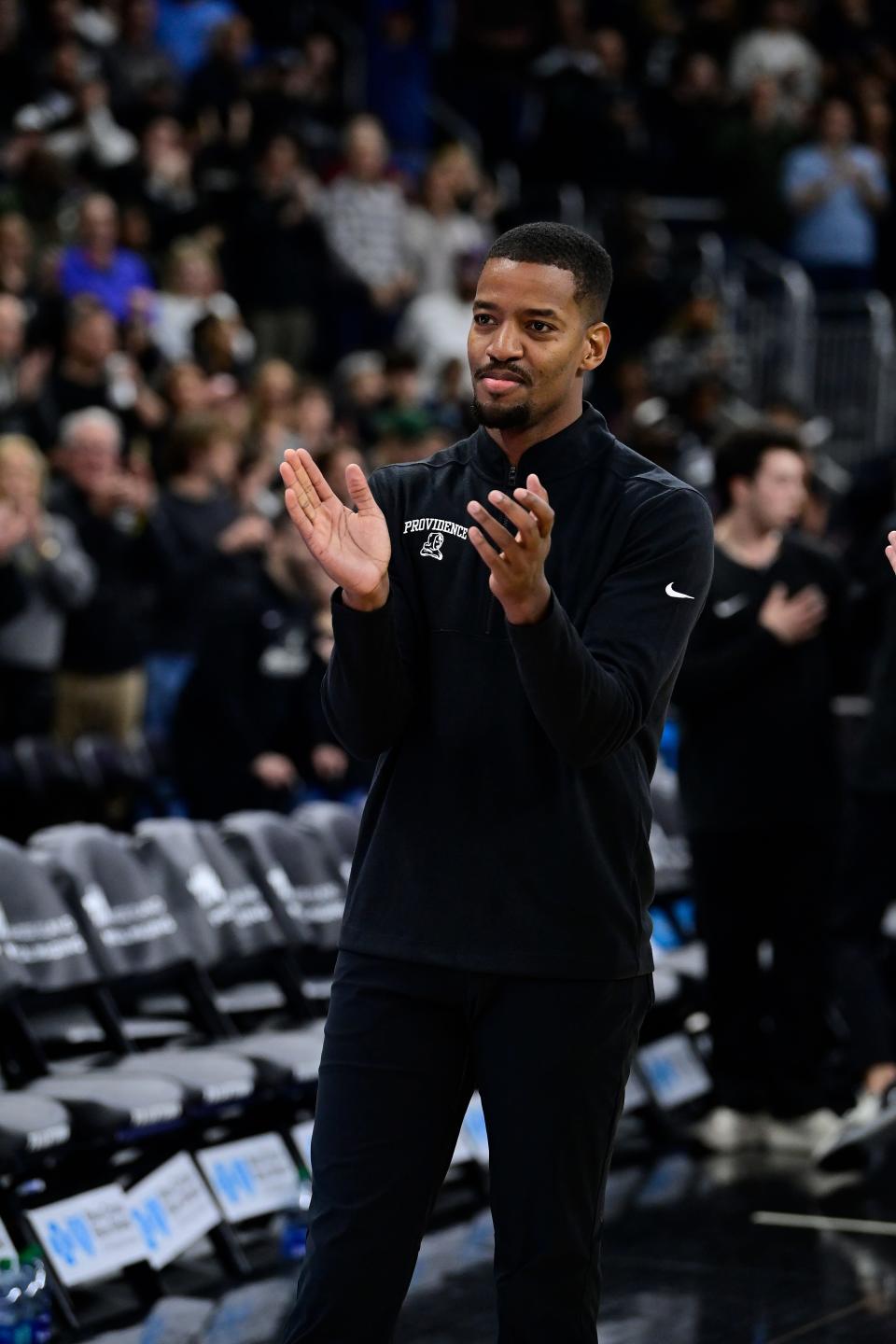 Dec 2, 2023; Providence, Rhode Island, USA; Providence Friars head coach Kim English reacts to the signing of the national anthem before a game against the Rhode Island Rams at Amica Mutual Pavilion. Mandatory Credit: Eric Canha-USA TODAY Sports