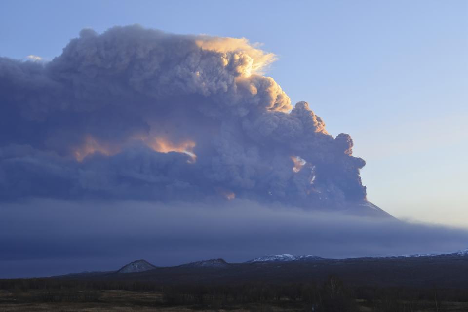 The Klyuchevskoy volcano, one of the highest active volcanoes in the world, erupts in Russia's northern Kamchatka Peninsula, Russian Far Eat, on Wednesday, Nov. 1, 2023. Huge ash columns erupted from Eurasia's tallest active volcano on Wednesday, forcing authorities to close schools in two towns in the region. (AP Photo/Yuri Demyanchuk)