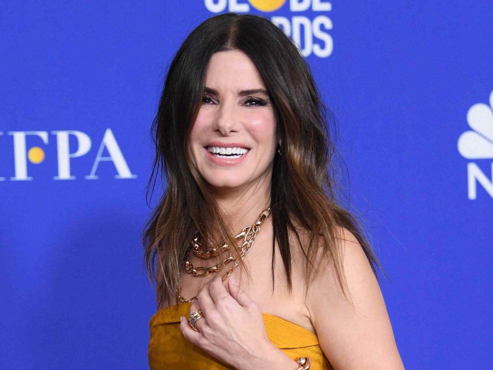 <p>Daniele Venturelli/WireImage</p> Sandra Bullock poses in the press room during the 77th Annual Golden Globe Awards on January 05, 2020 in Beverly Hills, California.