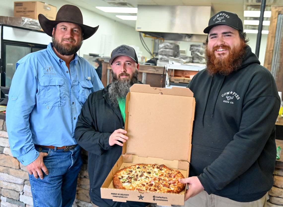 From left, JP Williams, John Wright and Josh Walsh, co-owners of Cow Pies Pizza Co. located at 6001 Watson Blvd. in Byron.