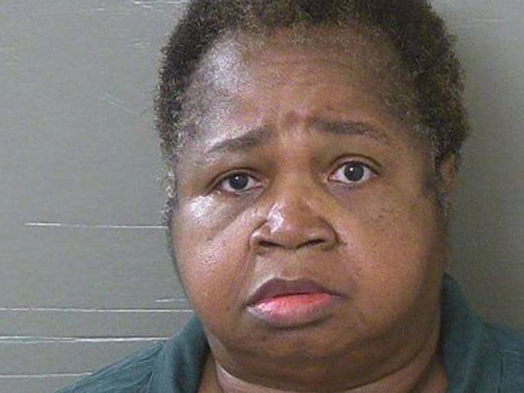 Obese woman jailed for life for sitting on and suffocating nine-year-old girl as punishment