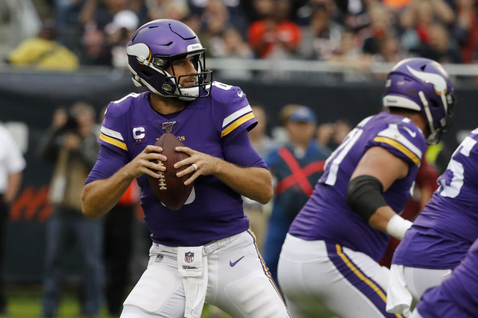 Minnesota Vikings quarterback Kirk Cousins drops back to pass during the first half of an NFL football game against the Chicago Bears Sunday, Sept. 29, 2019, in Chicago. (AP Photo/Charles Rex Arbogast)