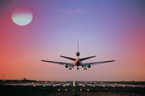 Plane landing on runway