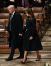 <p>For the National Prayer Service at the Washington National Cathedral, the First Lady chose a navy coat by designer Alice Roy. </p>