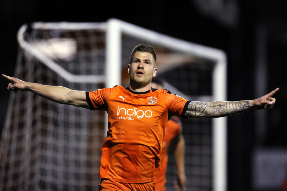 James Collins of Luton Town celebrates scoring his team's second goal during the Sky Bet League One match between Luton Town and AFC Wimbledon at Kenilworth Road.