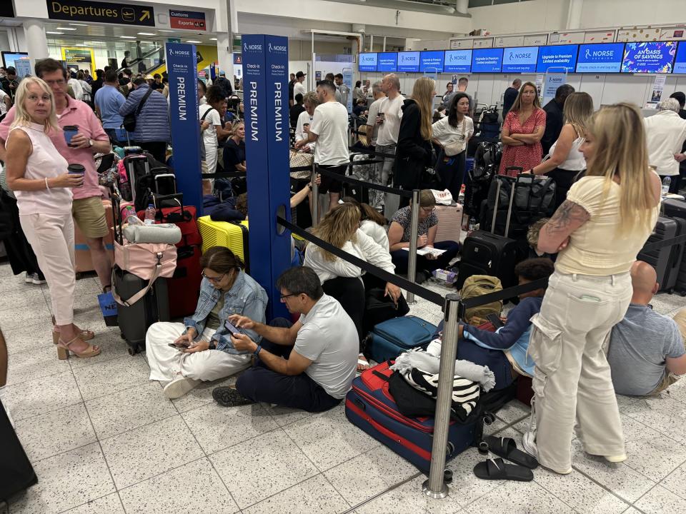 Passengers in the South Terminal at Gatwick Airport (Brian Lawless/PA) (PA Wire)