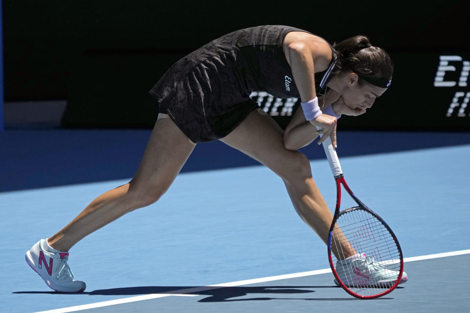 Caroline Garcia of France rests on her racket during her fourth round match against Magda Linette of Poland at the Australian Open tennis championship in Melbourne, Australia, Monday, Jan. 23, 2023. (AP Photo/Aaron Favila)