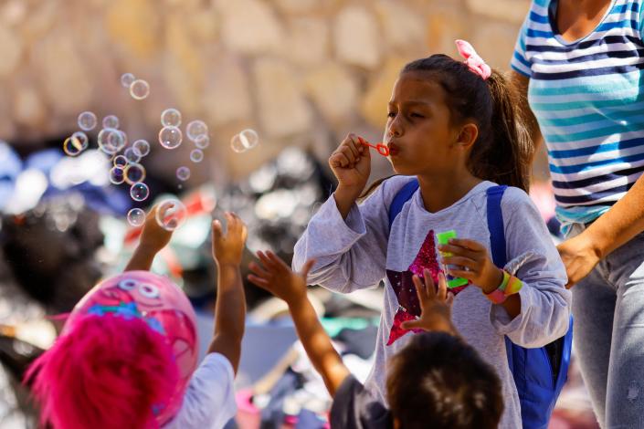 Reymara, 7, a migrant girl from Venezuela traveling with her family, plays with other children after being released from U.S. Border Patrol custody in El Paso, Texas, U.S., September 17, 2022 (REUTERS)