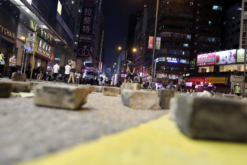 Paving blocks left by demonstrators are seen after an anti-government protest in Hong Kong