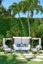 <p>Turn your backyard into a tropical oasis (well, kind of) by sticking patio furniture straight on the grass. Fill out the space with plush pillows, patterned blankets and battery-operated lanterns.</p>