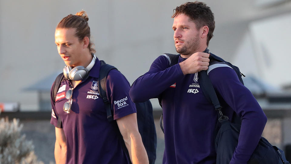 Jesse Hogan is pictured alongside Fremantle Dockers teammate Nat Fyfe.