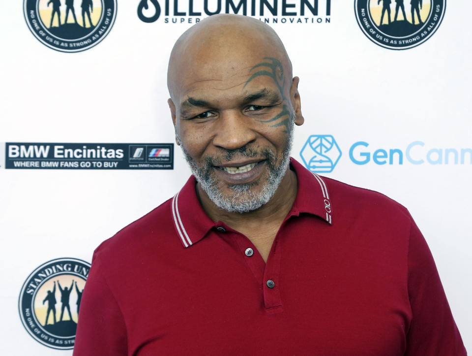 FILE - In this Aug. 2, 2019, file photo, Mike Tyson attends a celebrity golf tournament in Dana Point, Calif. Tyson and Roy Jones Jr. got permission from California's athletic commission to return to the boxing ring next month because their fight would be strictly an exhibition of their once-unparalleled skills. (Photo by Willy Sanjuan/Invision/AP, File)