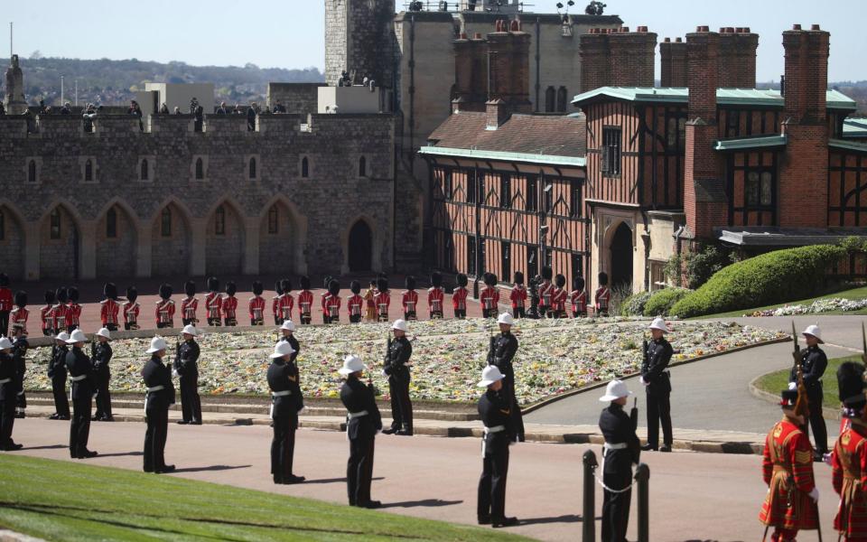 Royal Marines and members of the Foot Guards lining what will be the procession route - Steve Parsons/PA Pool