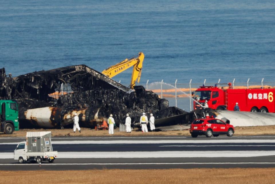 The passenger jet continued for 1km along the runway, in flames and with 367 passengers on board (Reuters)