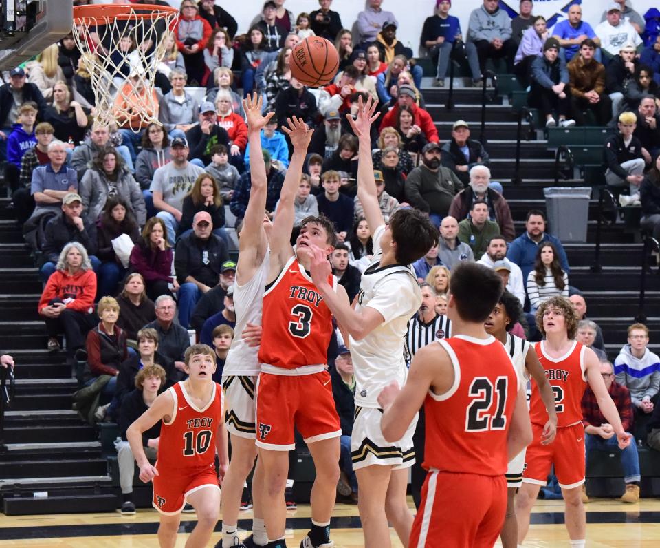 Troy's Colin Loveland (3) puts up a shot during a 66-55 win over Corning in the Boys Regional Division 2 championship game at the Josh Palmer Fund Clarion Classic on Dec. 30, 2023 at Elmira High School.
