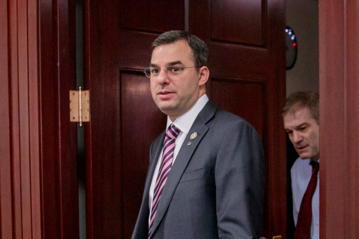 Rep. Justin Amash, R-Mich., followed by Rep. Jim Jordan, R-Ohio, leaving a closed-door strategy session on Capitol Hill, March 28, 2017. (AP Photo/J. Scott Applewhite, File)