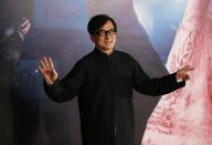 Hong Kong actor Jackie Chan poses on the red carpet during the 33rd Hong Kong Film Awards April 13, 2014. REUTERS/Tyrone Siu (CHINA - Tags: ENTERTAINMENT)