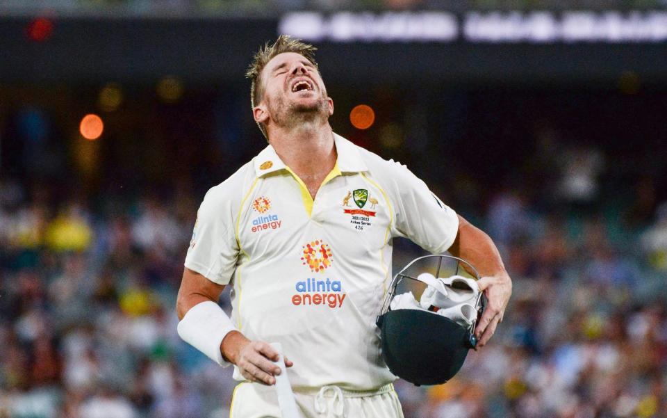 Australia's batsman David Warner reacts after being dismissed during day one of the second cricket Test match of the Ashes series between Australia and England in Adelaide on December 16, 2021. - GETTY IMAGES