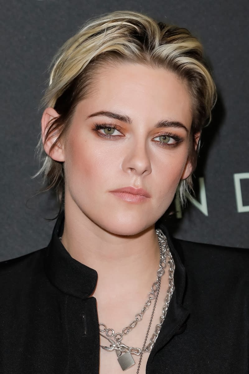 Kristen Stewart is pictured with a layered pixie cut whilst attending a special fan screening of 20th Century Fox's 