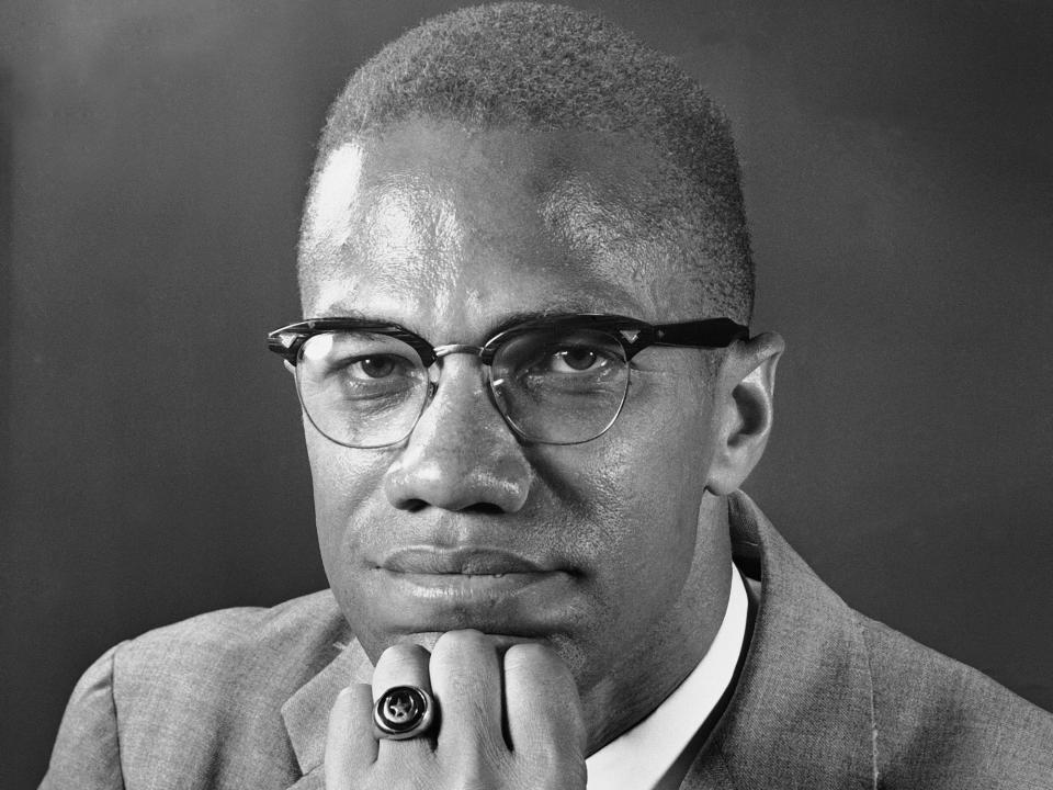 Black Muslim leader and Chairman of the Organization for Afro American Unity, Malcolm X, is shown at London Airport, Feb. 9, 1965, after he was refused entry into France.