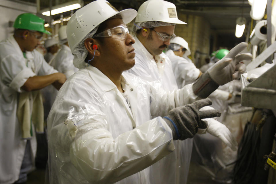 The prospect of jobs like those at the meatpacking plant West Liberty Foods in West Liberty, Iowa, has fueled the growth of the state's Latino population. (Photo: Jessica Rinaldi / Reuters)