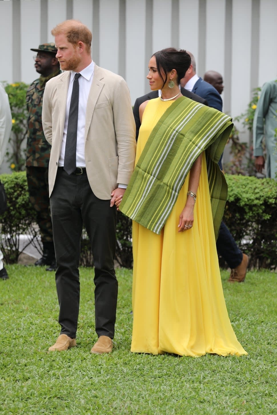 Meghan Markle's paid a sweet nod to her children with her yellow dress during her visit to Nigeria
