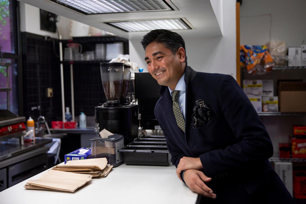 Cincinnati Mayor Aftab Pureval orders a coffee between meetings at City Hall in downtown Cincinnati on Tuesday, April 5, 2022.